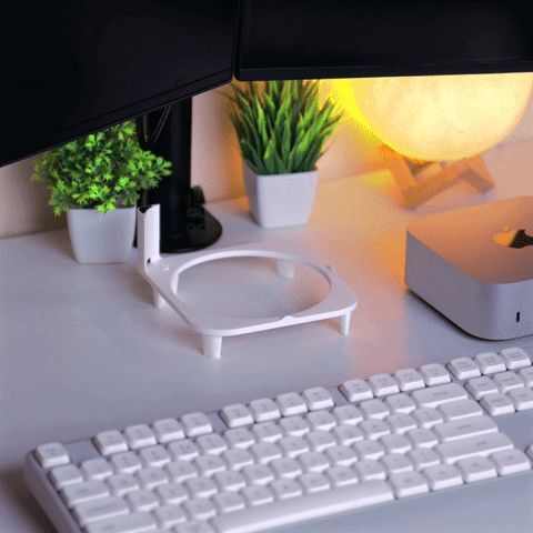 White Figroo Mac Mini M4 stand with integrated mechanical power button