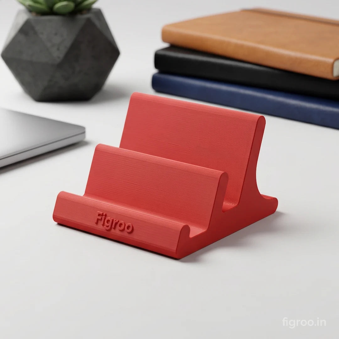 Red Figroo universal mobile phone stand on a clean minimal desk setup